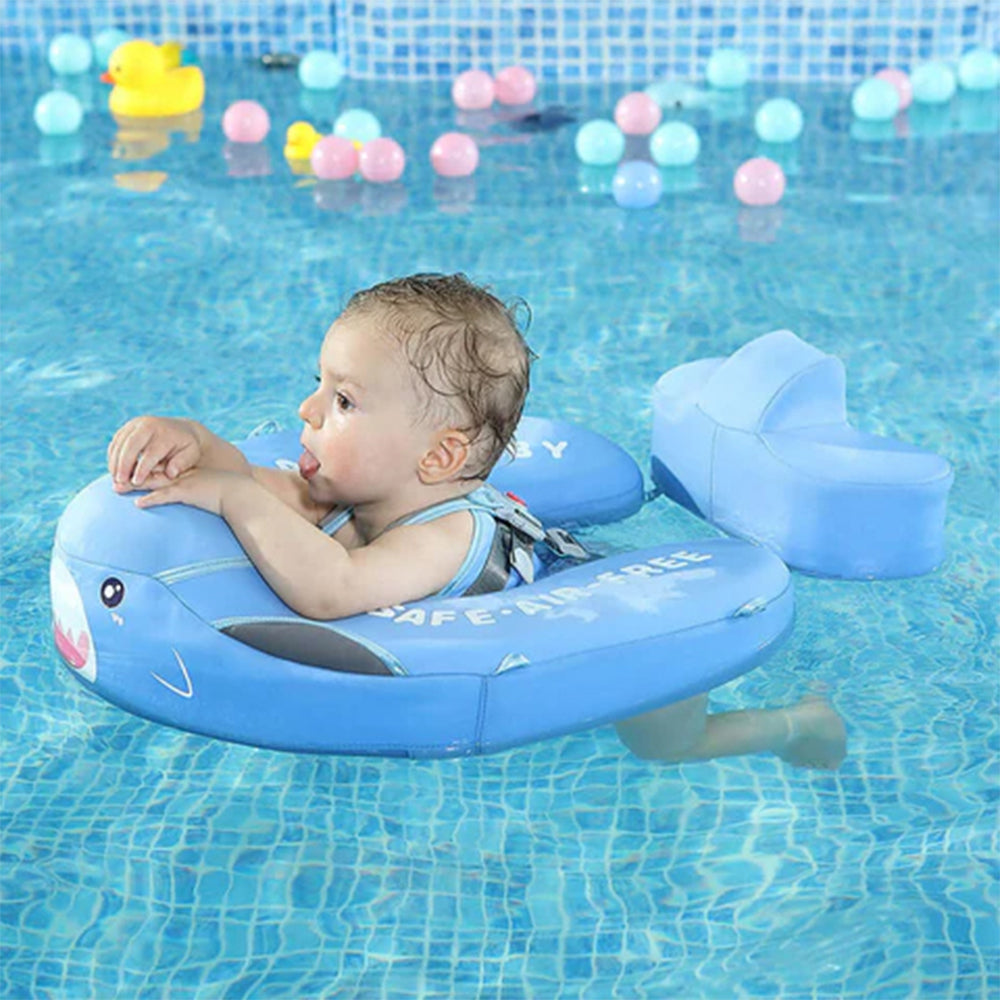 A baby safely enjoying the water in a Mambobaby™ Shark Float, demonstrating the stable 40-degree swimming angle.