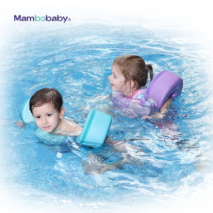 Baby in a pool using the Mambobaby 3-Stage Toddler Swim Trainer air-free float, with an adult within arm's reach.