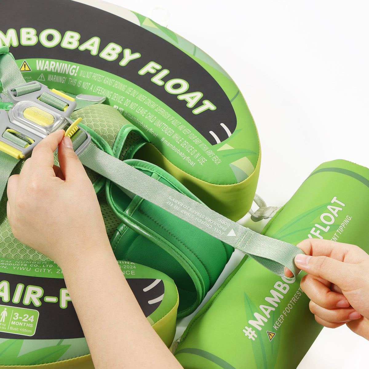 Close-up of the adjustable strap buckles and lock button on the Mambobaby Panda.